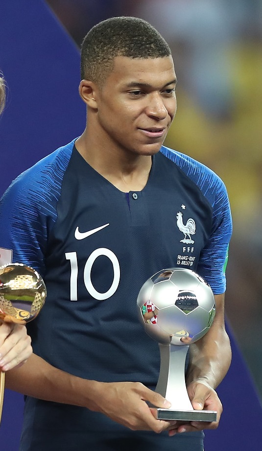 Kylian Mbappé receiving the Best Young Player award at the 2018 FIFA World Cup